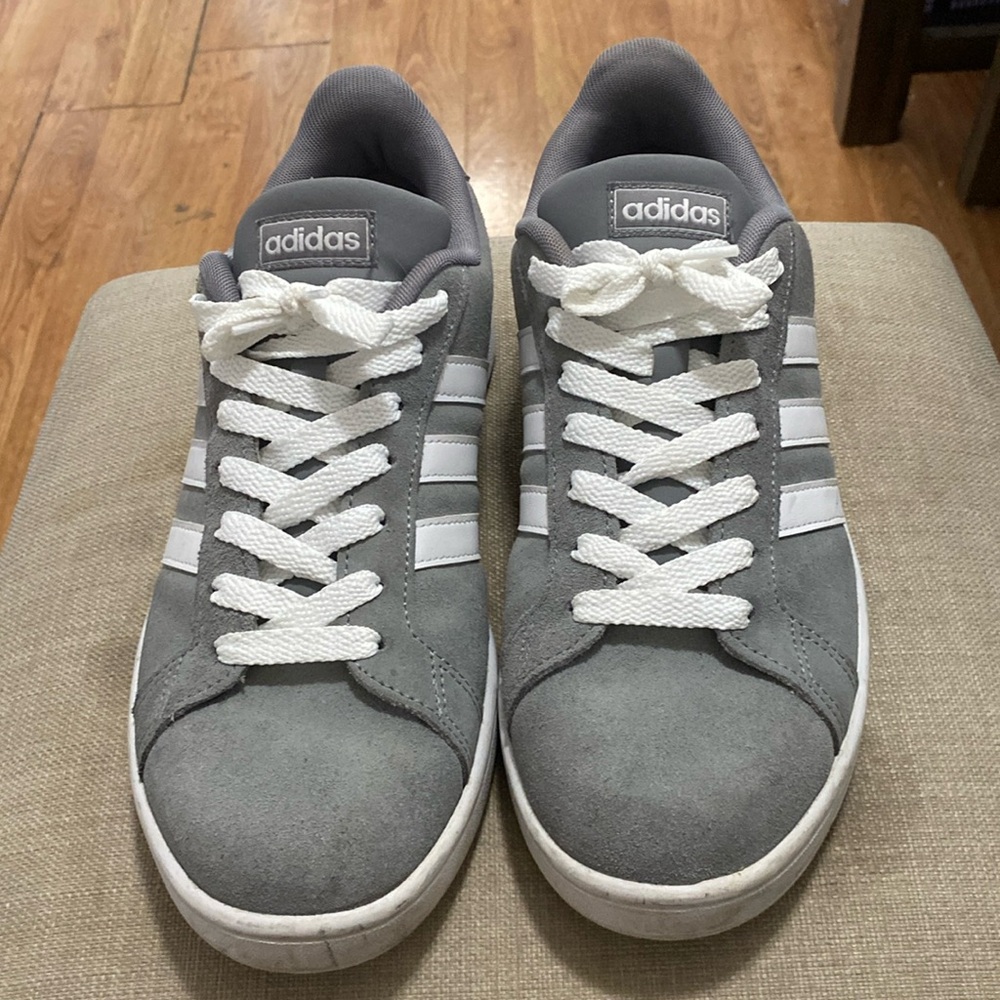 Adidas court tennis shoes.